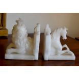 A pair of alabaster / white marble bookends, lion and unicorn], the lion bearing a silver plaque