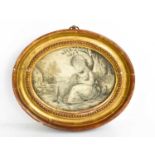 A Victorian oval needlework panel depicting a young girl and lamb beneath a tree, in a giltwood