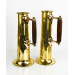 Trench art: A pair of brass tankards with copper and wooden handles29cm high