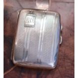 A silver cigarette case, engraved Edith J Sutton, 1953, Chester 1934, machine engraved, 7.02toz.