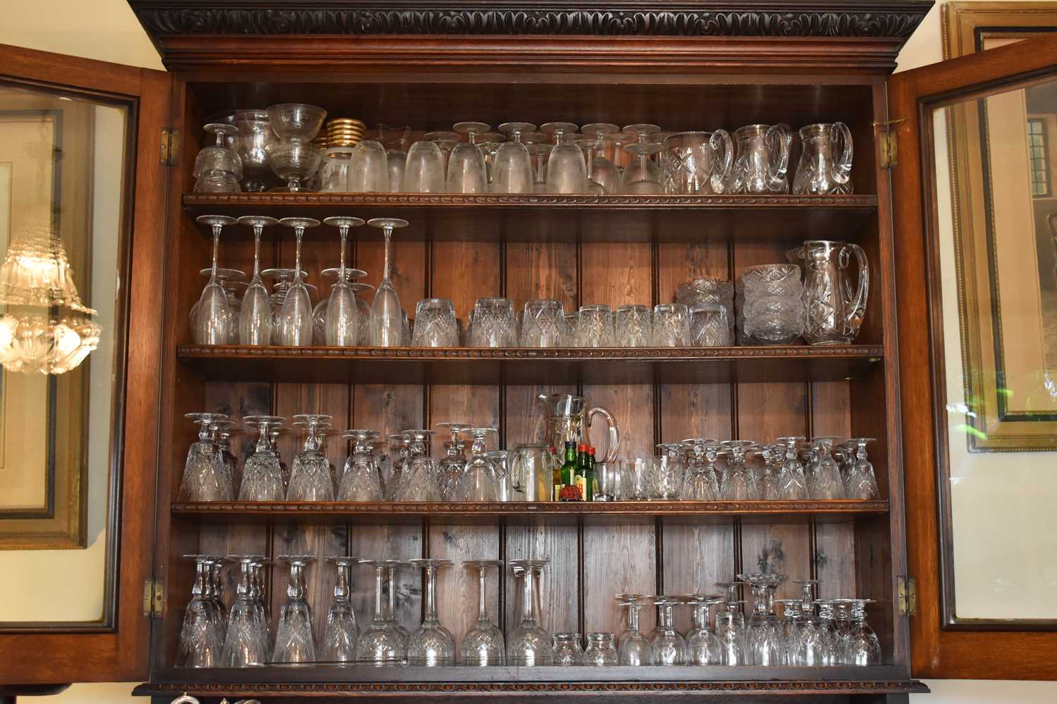A large quantity of cut crystal and glassware, to include sets of whisky tumblers, wine glasses,