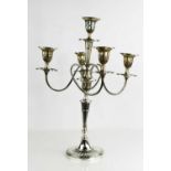A Walker and Hall silver five light candelabra, with four scrolling branches to fluted sconces,