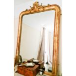 A fine 19th century giltwood wall mirror, with crested carved top. 157cms x 90cms Please note this