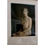 Two photographic portraits of Mary, both signed, and dated 1934 and 1928.