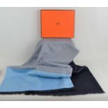 A Hermes dark blue cashmere and pale blue silk scarf with geometric pattern in original box