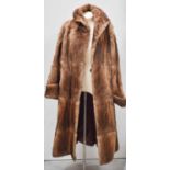 A vintage full length Musquash fur coat