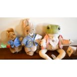 Three Beatrix Potter Peter Rabbit soft toys including Jeremy Fisher and two Peter Rabbits