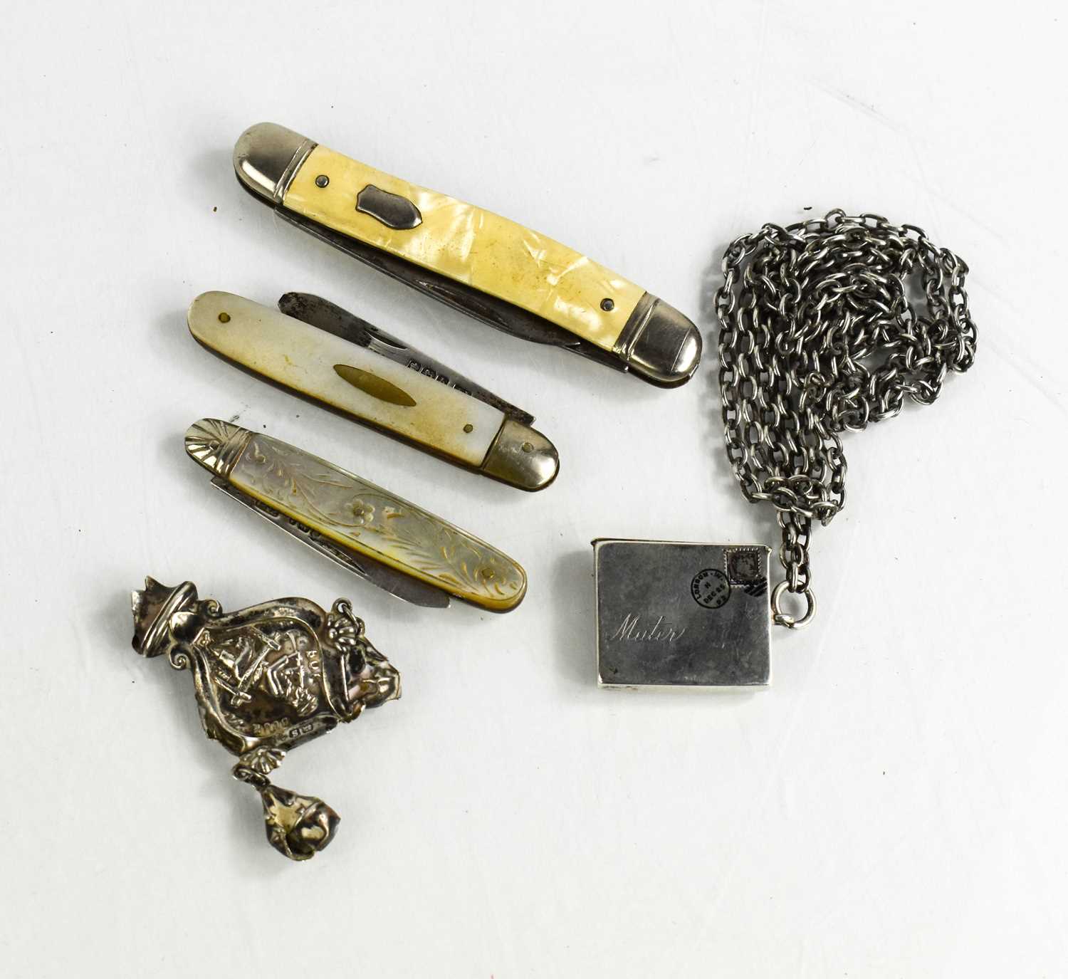 Two 19th century silver and mother of pearl fruit knives, a steel penknife, a silver section of a