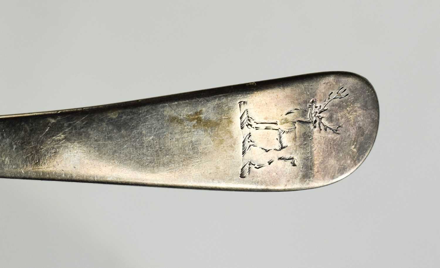 A large silver serving spoon, engraved with stag, circa 1770, indistinct hallmarks, 2.8g.Condition - Image 2 of 2