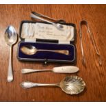 A silver christening spoon in the original presentation box together with a a pair of silver sugar
