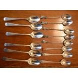 A group of silver apostle spoons, 1.44 toz together with a quantity of silver teaspoons of various