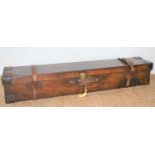 An early 19th century leather bound gun case believed to be for a blunderbuss, brass lock and key,
