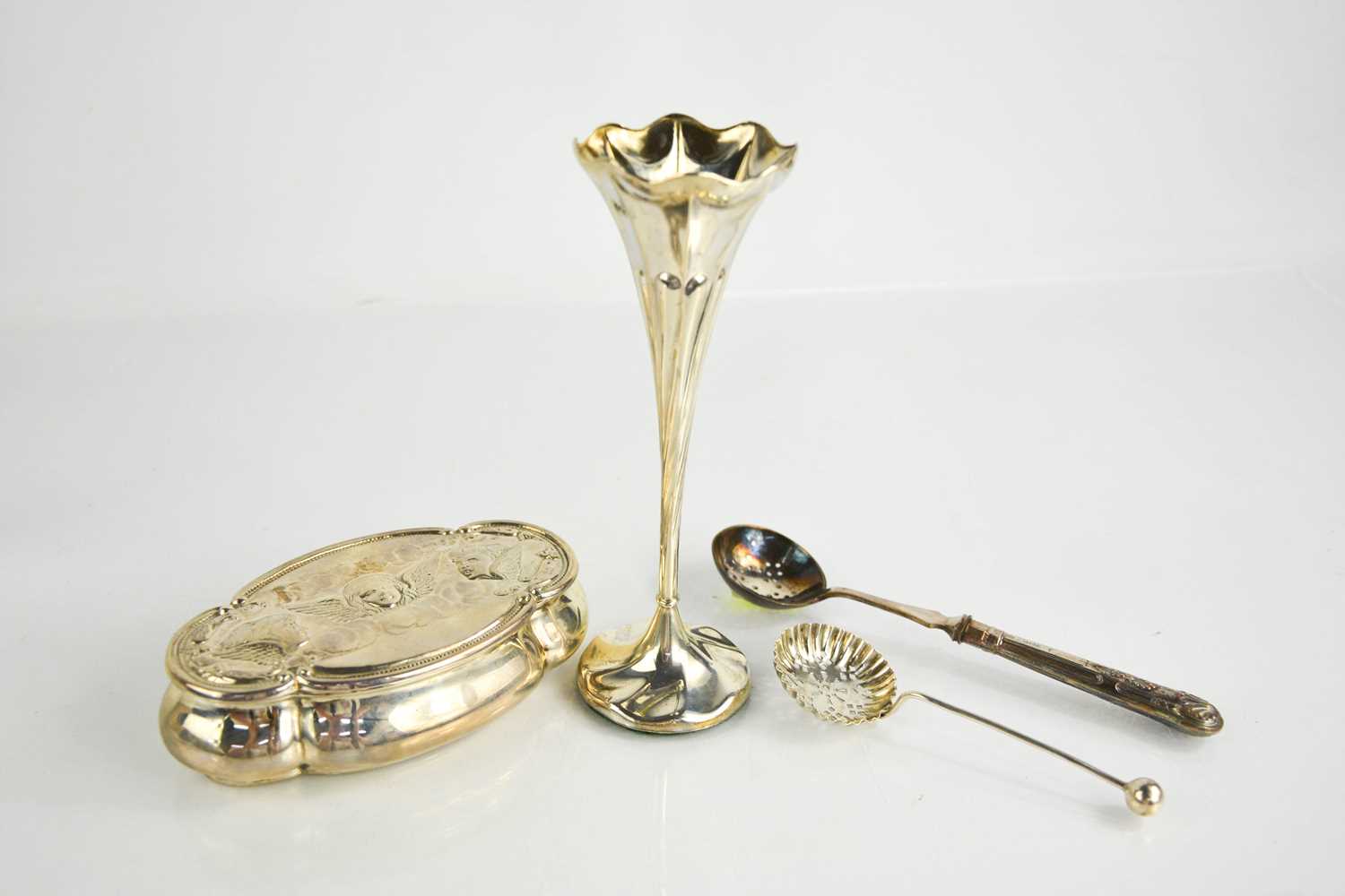 An Art Nouveau style silver bud vase with weighted base, and a silver trinket box with residual