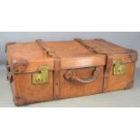 A late 19th / early 20th century leather suitcase trunk by Aux Etats-Unis Paris,original tray