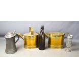 Two brass watering cans, a pewter lidded tankard, goblet and glass bottle.