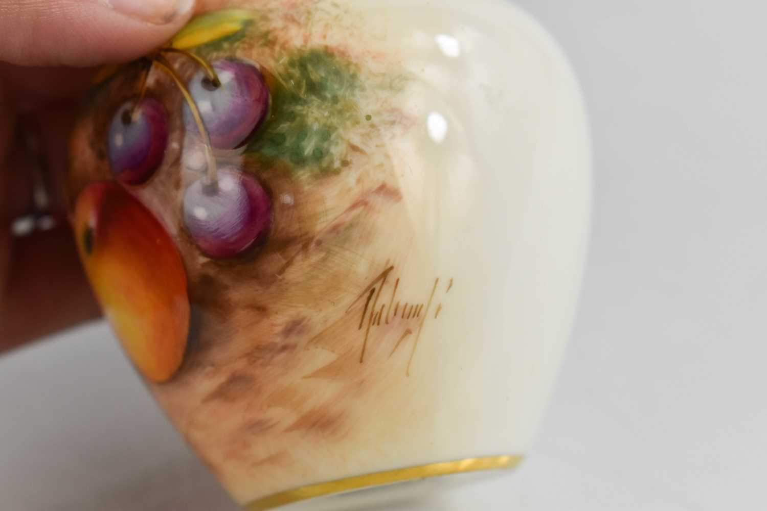 A Royal Worcester vase, painted with fruits and signed, 7cm. - Image 2 of 2