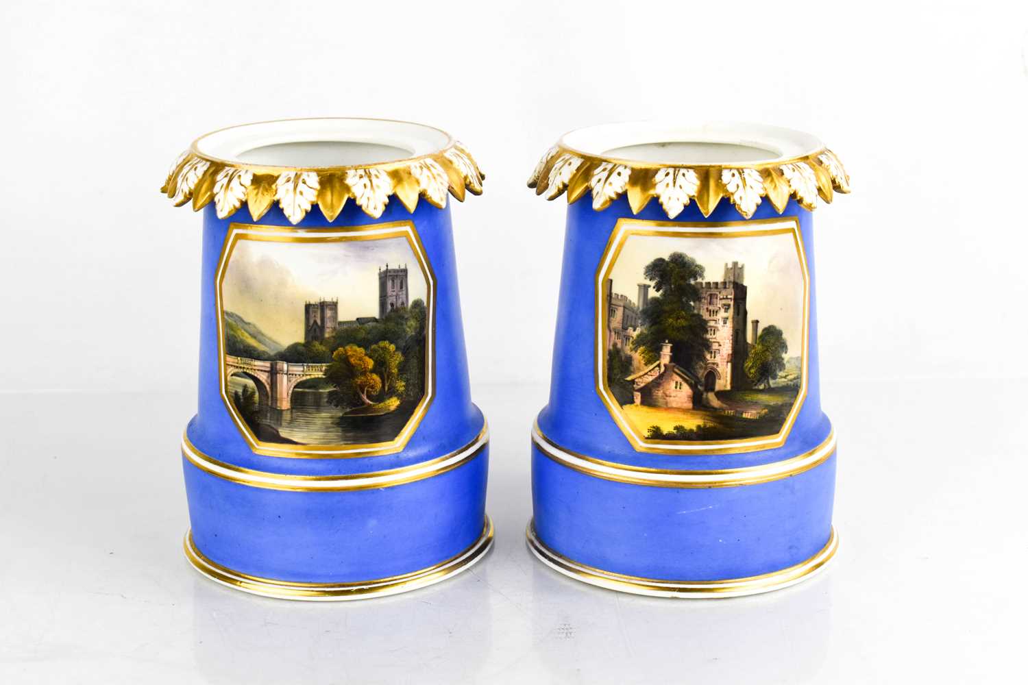 A pair of early Crown Derby vases, painted with named views of Hade Hall, Derbyshire and a View Nr