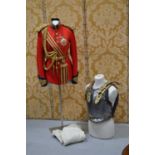 A 19th century lifeguards uniform with later epaulettes, 19th century breast plate and aiguillette