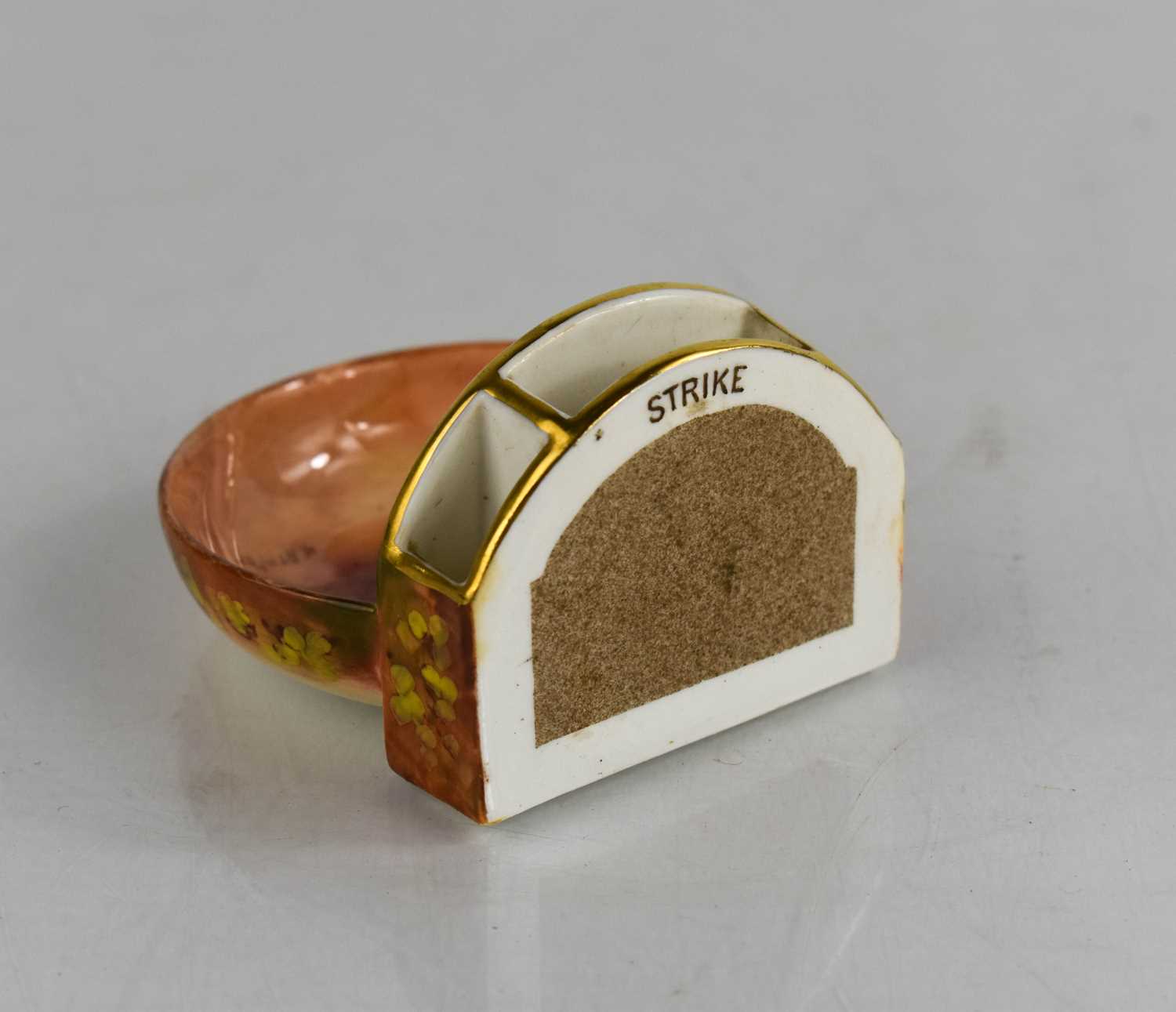 A Royal Worcester porcelain matchbox holder, painted with fruit and signed Ayrton, with Strike board - Image 3 of 3