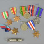 A group of WWII medals to include a 1945-1948 Palestine medal to LT G. Horsey and a military