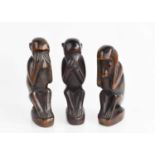 A set of three hardwood carved monkeys, 'See No Evil, Hear No Evil and Speak No Evil', possibly