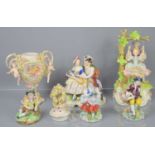 A group of continental porcelain figures and twin handled urn, to include Rudolf Kammer and