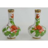 A pair of Chinese white ground cloisonne vases with turquoise base and polychrome stylised foliate