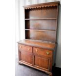 A 19th century oak welsh dresser, two drawers over two cupboards199cm high by 120cm wide