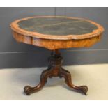 A Victorian burr walnut centre table of octagonal form inliad with boxwood marquetry decoration