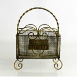 A vintage brass table letter rack, 18cm high.