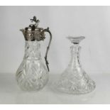 A silver plated and cut glass claret jug with lion and sheild form thumb piece, together with a