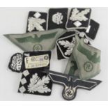 A group of German military collar tabs and cloth badges