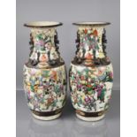 A pair of 19th century Chinese crackle glazed vases, decorated with polychrome warriors, and