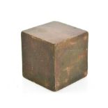 A solid antique bronze cube, 8cm square.