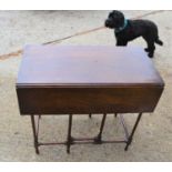 A 19th century mahogany drop leaf occasional table