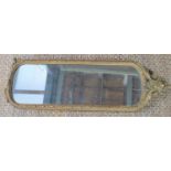 A Victorian hall mirror, with decorative crested top, 114 by 36cm