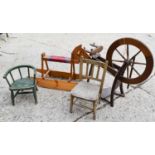 A vintage wooden rocking horse together with a spinning wheel and two childs chairs