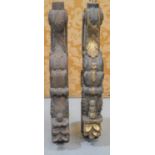 Two antique carved console legs, with some residual gilding, 74cm long.