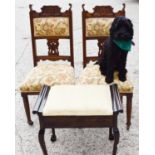 A 19th century mahogany piano stool, with upholstered lift up seat, and raised on cabriole legs with