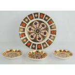 A group of Royal Crown Derby Imari pattern 1128 plate and scalloped edge dishes