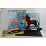 A group of vintage board games to include Monopoly, Go, Royal Ascot and others