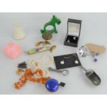 A group of collectibles to include a silver and enamel brooch, silver earings, penknife, unmounted