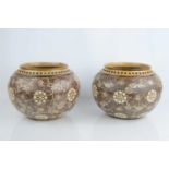 A pair of Doulton Silicon Lambeth ware jardinieres, circa 1920, of ovoid form with pierced rims, the