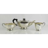 A silver Art Deco tea set, comprising teapot, sugar bowl and milk jug, Sheffield 1935, 34toz.