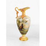 A Royal Worcester ewer by JAS Stinton, with pheasants in a landscape, scoll handle and pierced