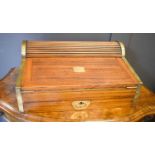 A Victorian teak campaign writing slope with tambour top, folding action including ruler with