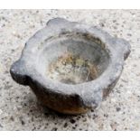 A large 19th century stone pestle20cm high