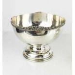 A George V silver rose bowl with a scroll and shell decorative border, Birmingham 1926,542g.