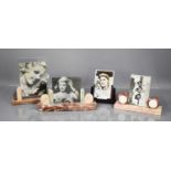 Four Art Deco picture frames, one in bakelite with two postcards of Greta Garbo, and three marble