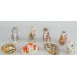 A group of eight Royal Crown Derby paperweights comprising Collector's Guild Exclusive Catnip Kitten